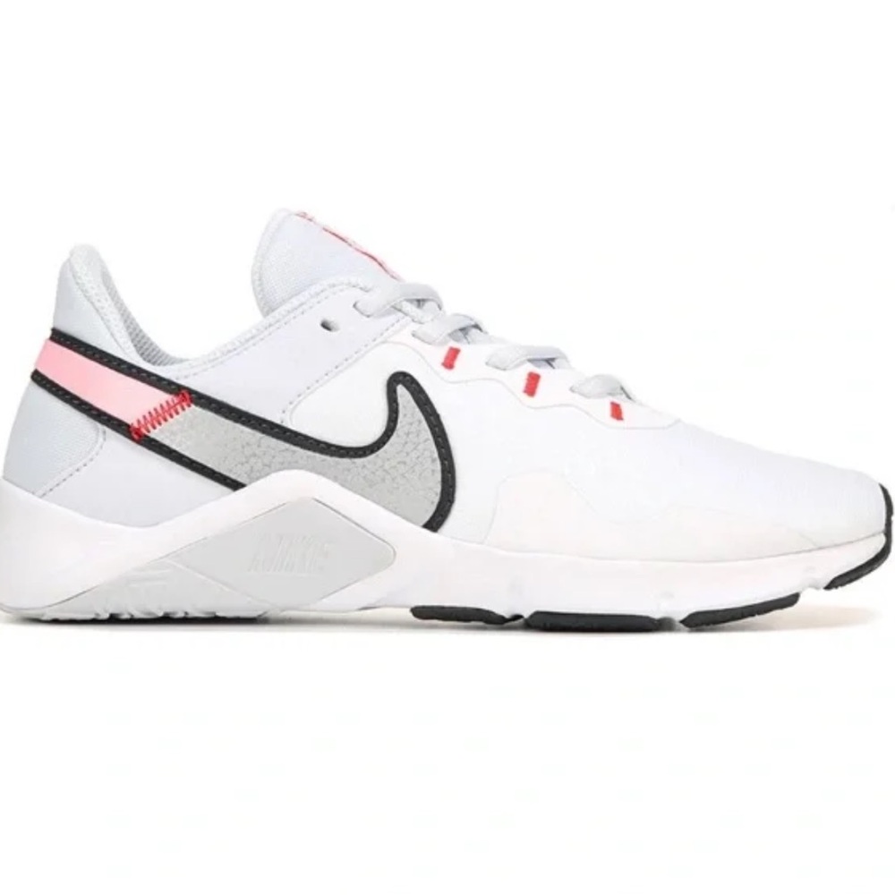 Nike Women’s Legend Essential 2 Running shoe in Football Grey size 7